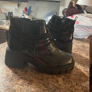 Black boots with black chains